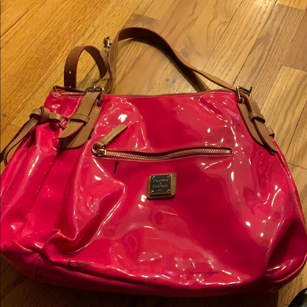 MUST GO: Hot pink Dooney and Bourke bag